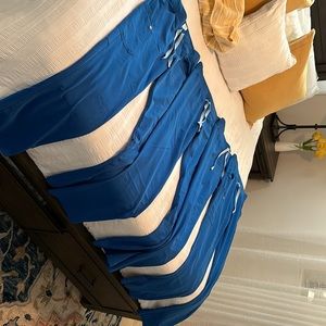 Used bundle of 4 FIGS Royal straight leg scrubs. Small and tall